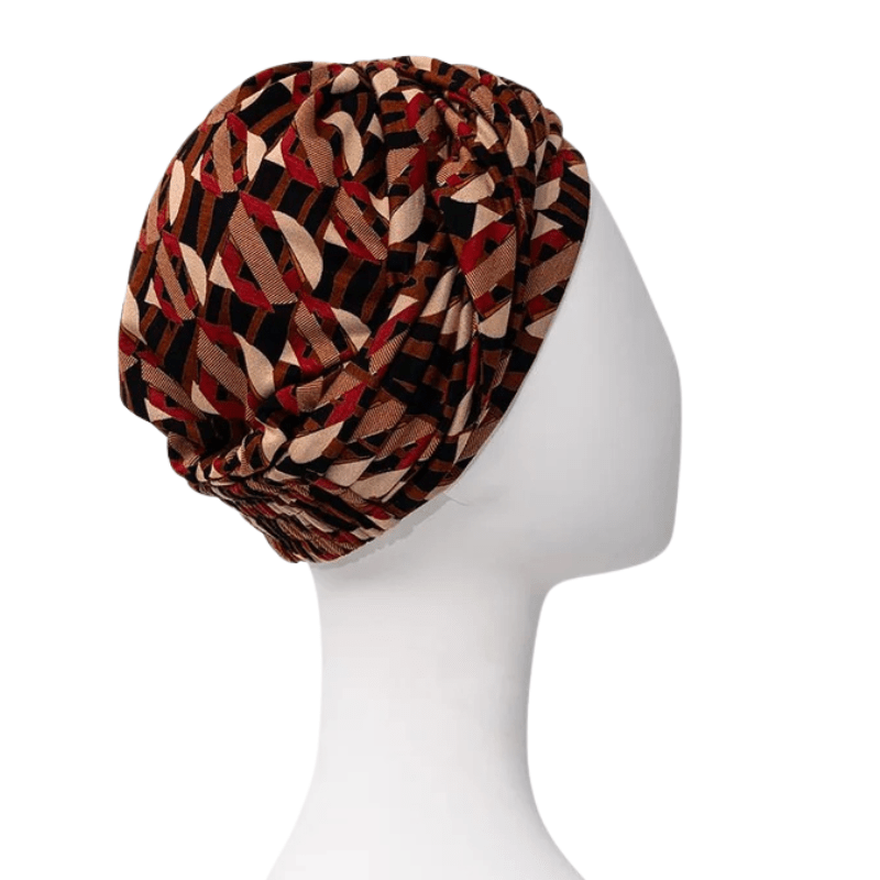 Turban Sapphire Boho motif Tribal Art, vu de côté droit sur un mannequin blanc