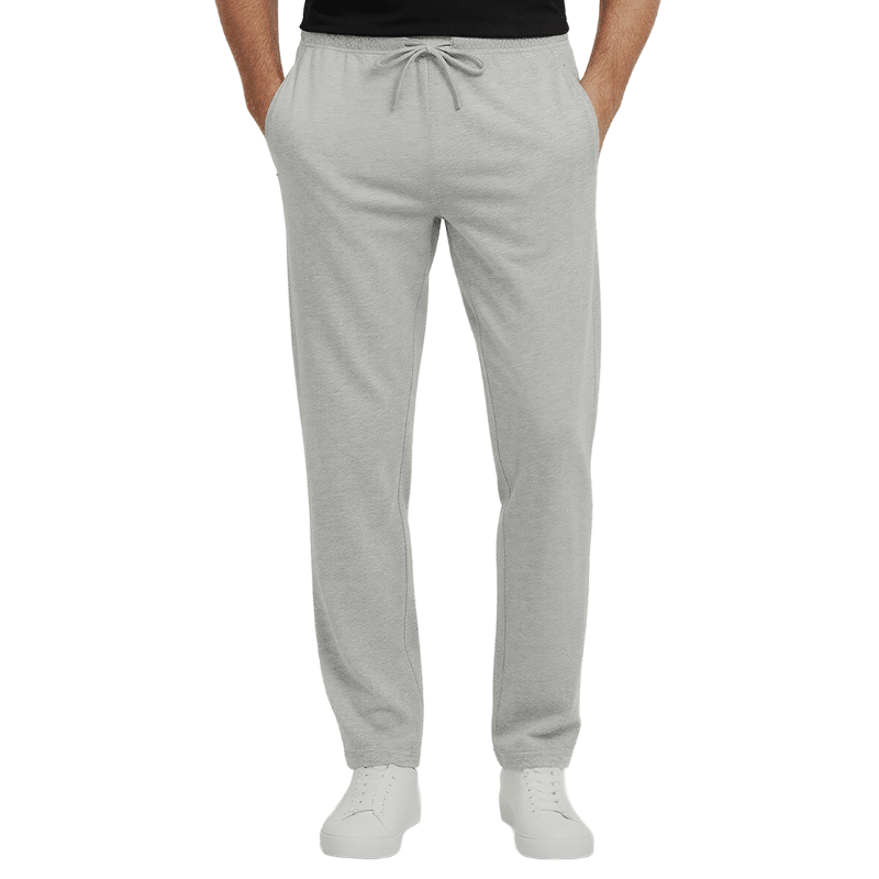 Pantalon de jogging gris avec cordon de serrage à la taille et poches zippées, vu de face sur une personne