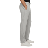 Pantalon de jogging gris avec fermetures éclair latérales fermées et poches, vu de côté sur une personne