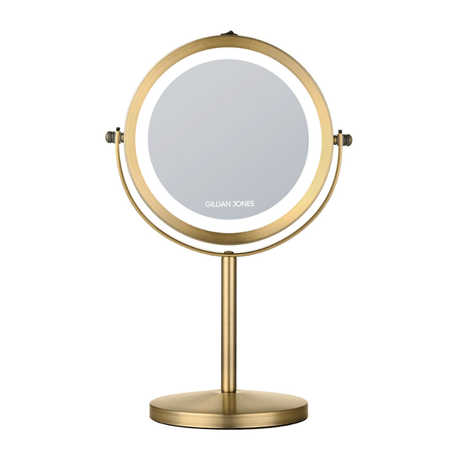 Miroir de maquillage rond doré avec lumière LED, vue de face avec logo Gillian Jones