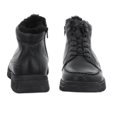 Deux bottes homme Waldläufer noires, l'une vue de face avec lacets, l'autre de dos avec doublure chaude